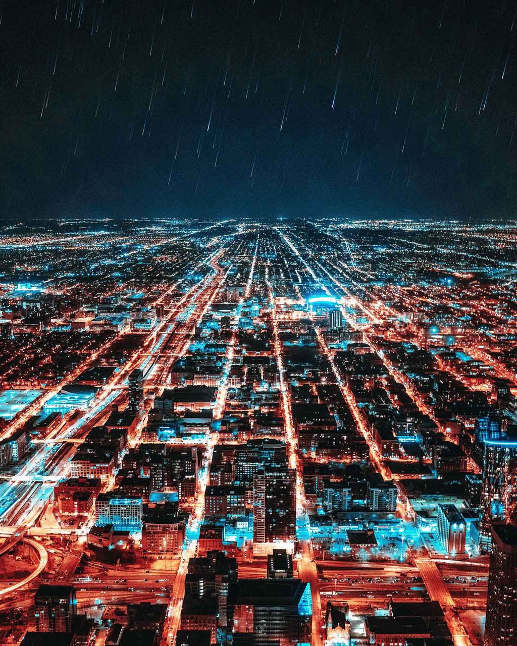 aerial view of lit up city blocks