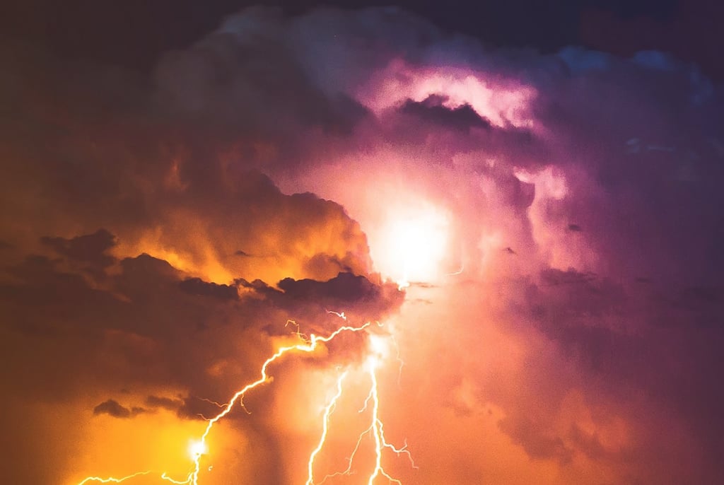 Lightening against cloudy sky