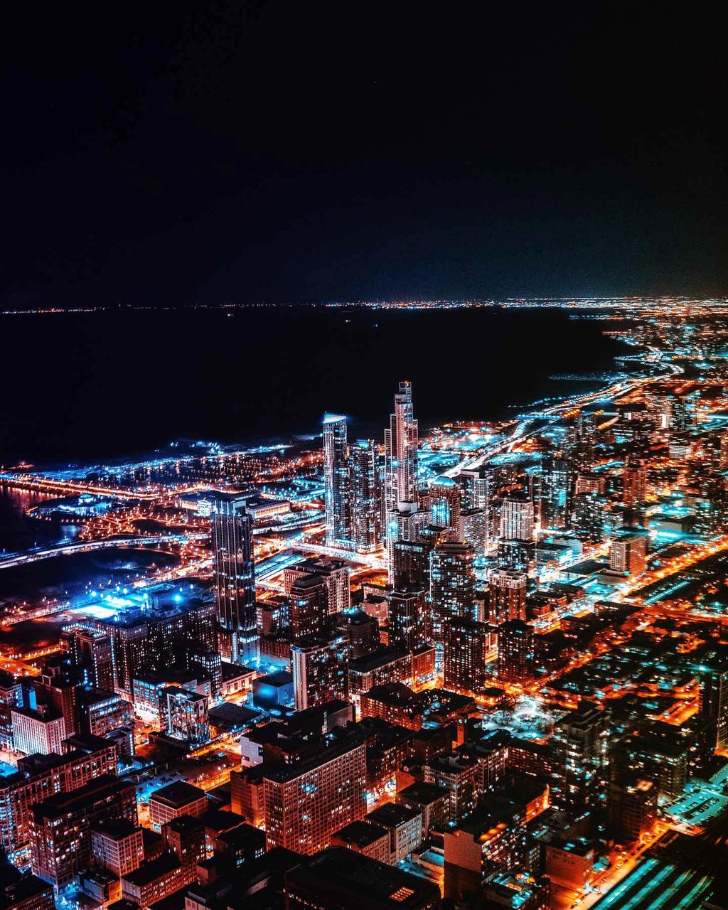 Aerial view of coastal city at night